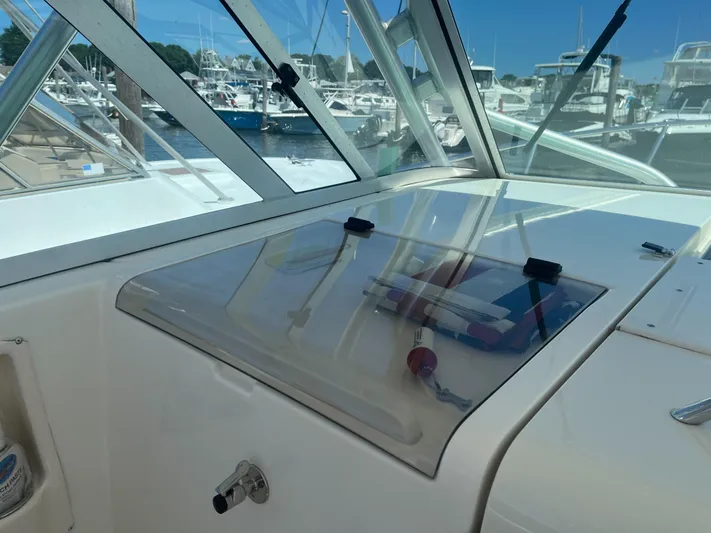  Yacht Photos Pics 2008 Rampage 30 Express boat dashboard with marina view.