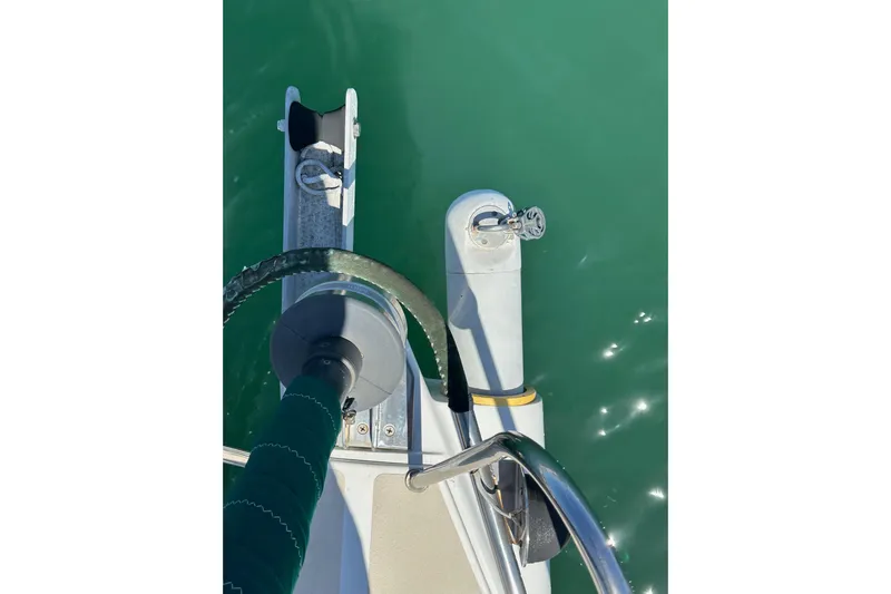 Ma Jolie Yacht Photos Pics Close-up of a 1996 J Boats J/120 sailboat's bow and anchor mechanism.