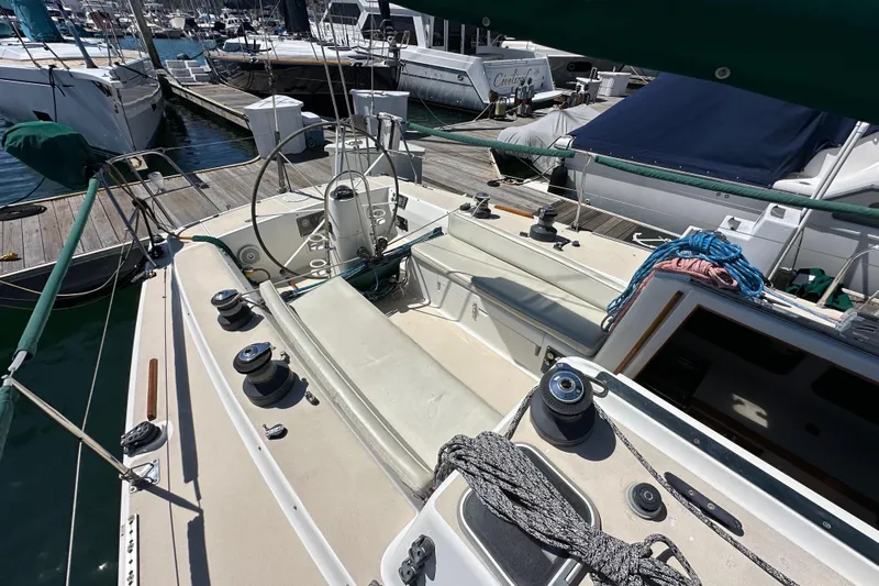 Ma Jolie Yacht Photos Pics 1996 J Boats J/120 sailboat cockpit with winches and ropes, docked at marina.