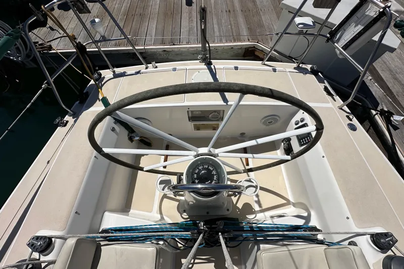 Ma Jolie Yacht Photos Pics Cockpit view of 1996 J Boats J/120 sailboat with steering wheel and navigation instruments.