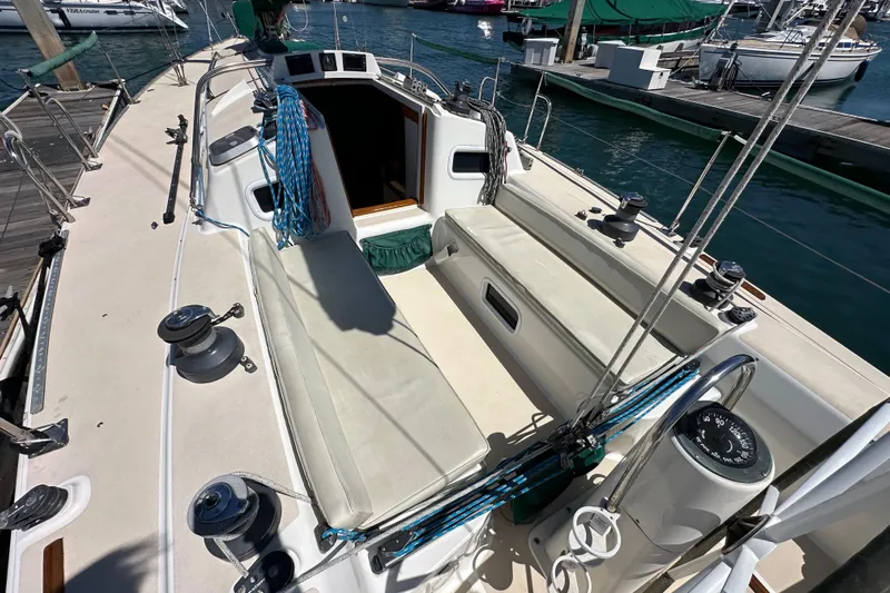 Ma Jolie Yacht Photos Pics 1996 J Boats J/120 sailboat cockpit with winches and ropes, docked at marina.