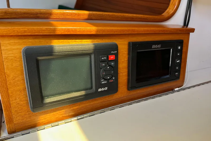 Ma Jolie Yacht Photos Pics B&G navigation instruments on 1996 J Boats J/120 yacht, mounted on wooden panel.