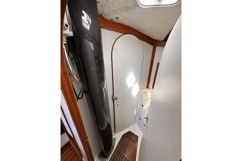 Ma Jolie Yacht Photos Pics Interior of 1996 J Boats J/120 sailboat, featuring sleek design and wooden accents.