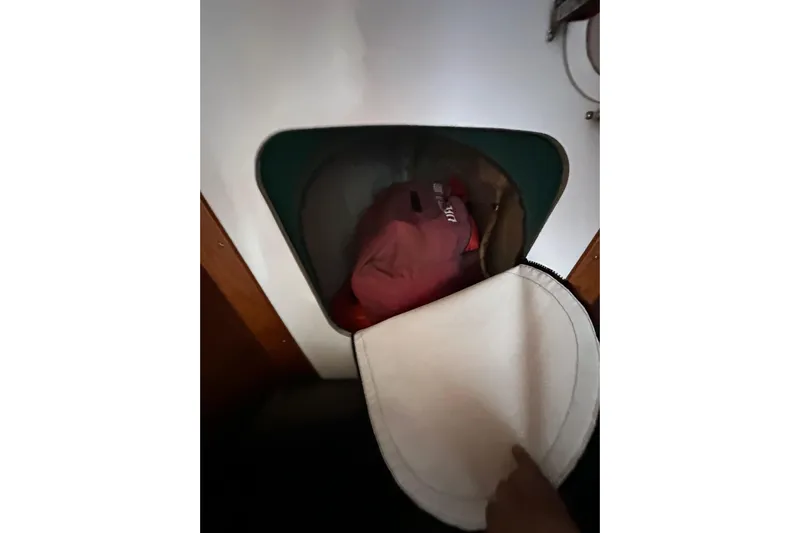 Ma Jolie Yacht Photos Pics Interior storage compartment of a 1996 J Boats J/120 sailboat.