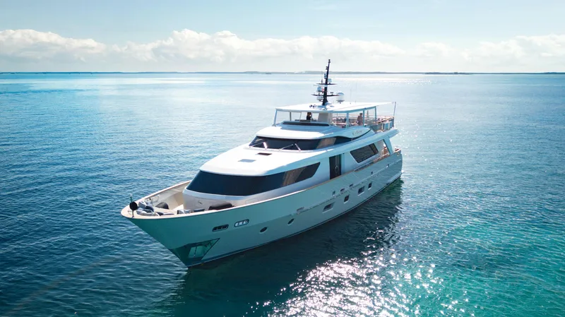 Fontana Yacht Photos Pics Luxurious 2012 Sanlorenzo SD92 yacht cruising on serene blue waters.
