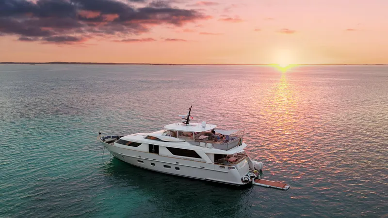 Fontana Yacht Photos Pics Sanlorenzo SD92 yacht at sunset, 2012 model, cruising on tranquil waters.