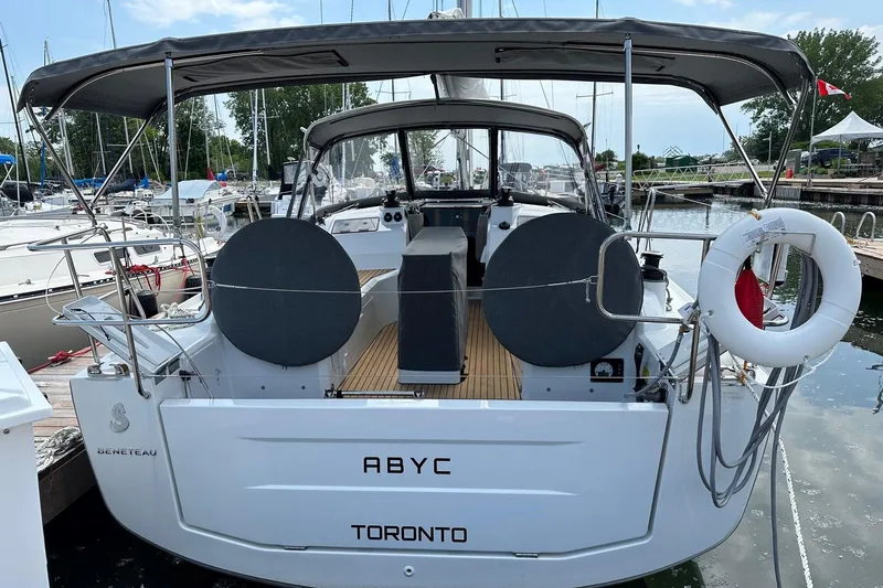 Knotaulis Yacht Photos Pics 2023 Beneteau Oceanis 34.1 yacht docked in Toronto marina.