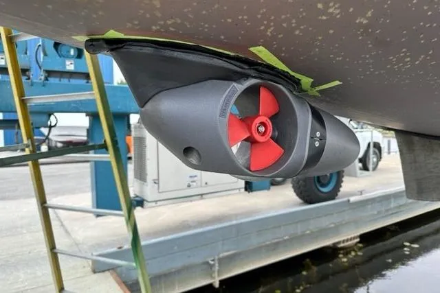 Knotaulis Yacht Photos Pics Bow thruster on 2023 Beneteau Oceanis 34.1 yacht, dockside view.