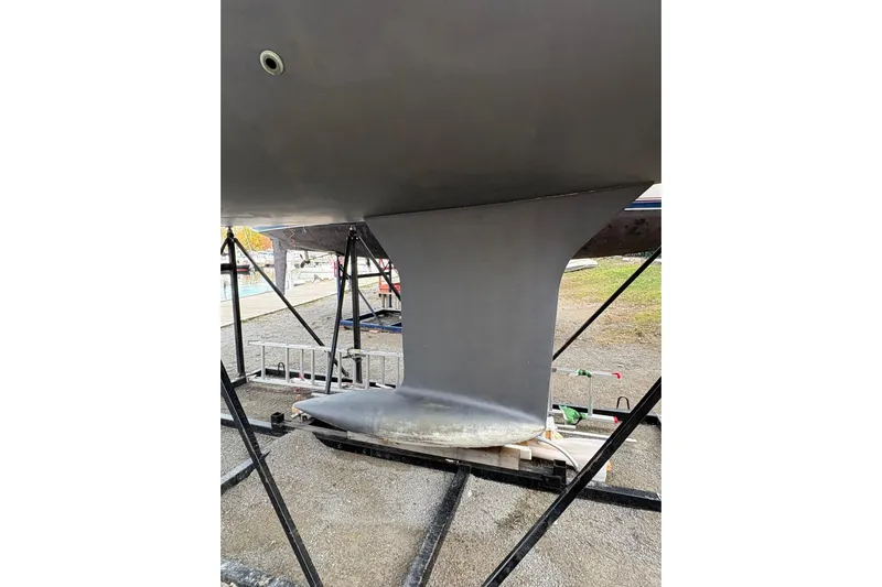 Knotaulis Yacht Photos Pics 2023 Beneteau Oceanis 34.1 sailboat keel on dry dock.