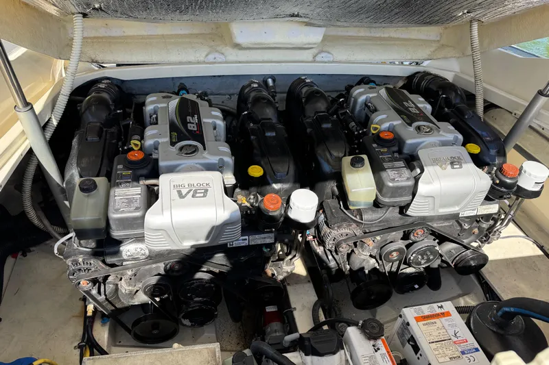  Yacht Photos Pics Twin V8 engines in a 2015 Chris-Craft Corsair 32 boat, showcasing powerful performance.