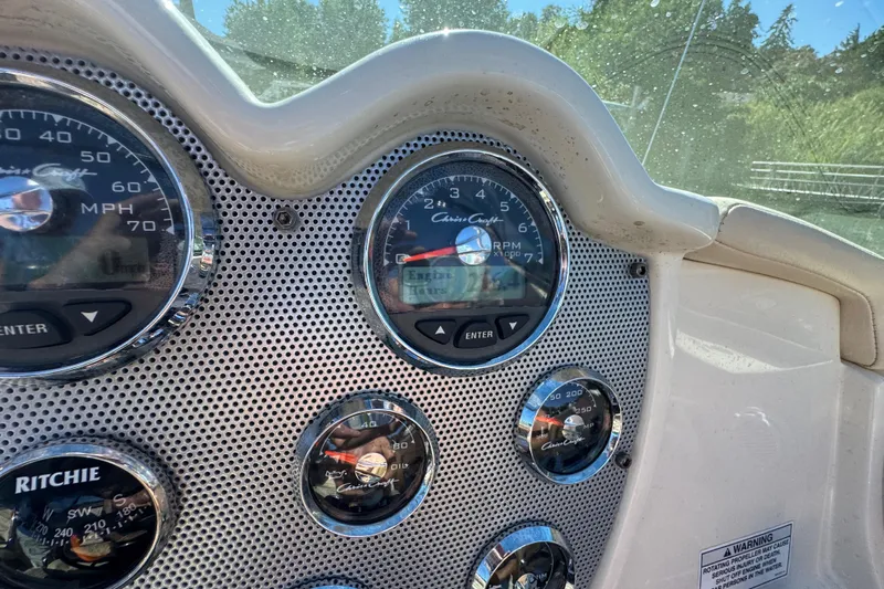  Yacht Photos Pics Dashboard of 2015 Chris-Craft Corsair 32 boat with speedometer and gauges.