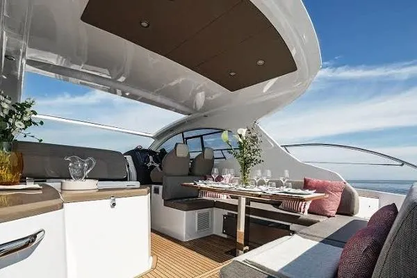 Ghost Yacht Photos Pics Luxurious 2018 Azimut Atlantis 43 yacht interior with elegant dining setup and modern design.