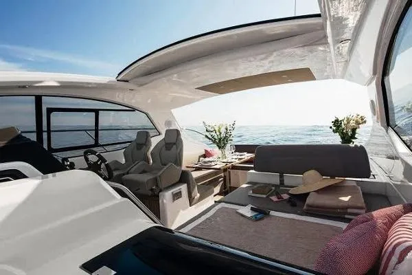 Ghost Yacht Photos Pics Luxurious 2018 Azimut Atlantis 43 yacht interior with ocean view and elegant seating area.