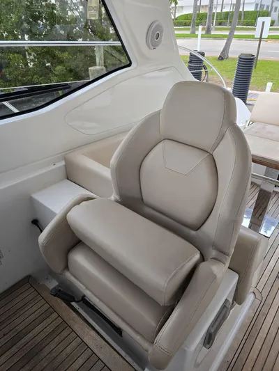 Ghost Yacht Photos Pics Luxury seating on 2018 Azimut Atlantis 43 yacht, featuring beige leather upholstery.