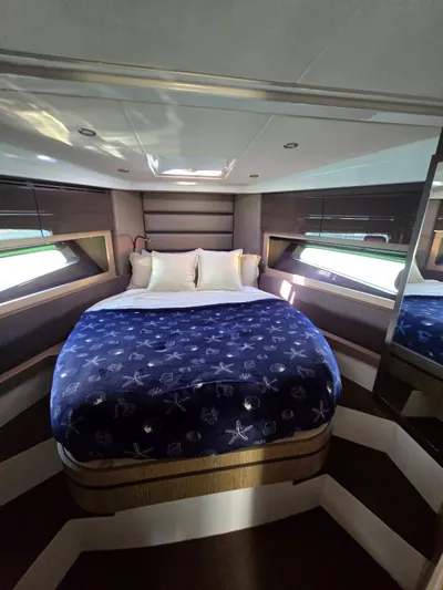 Ghost Yacht Photos Pics Luxurious bedroom interior of 2018 Azimut Atlantis 43 yacht with elegant bedding.