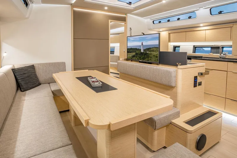  Yacht Photos Pics Luxurious interior of 2025 Hanse 510 yacht with modern furnishings and sleek design.