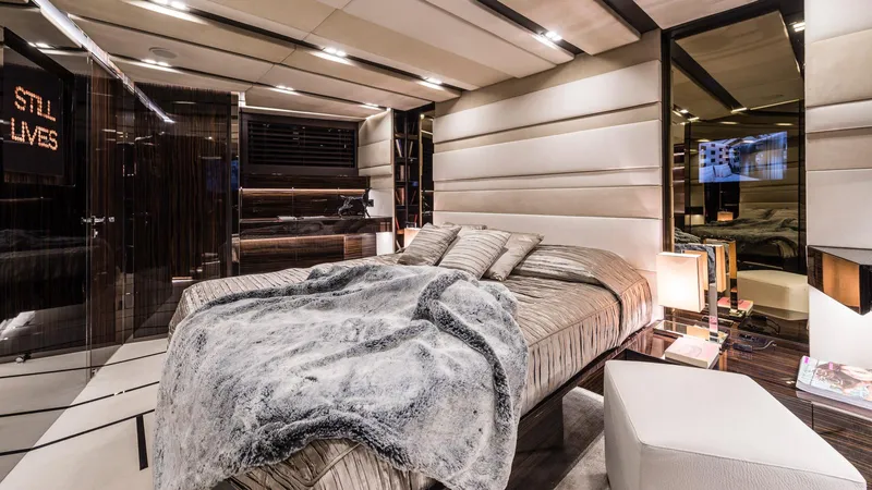  Yacht Photos Pics Luxurious bedroom interior on 2014 Admiral Silent 76 yacht, featuring elegant decor and modern amenities.