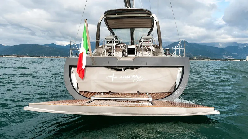  Yacht Photos Pics Luxury Admiral Silent 76 yacht, 2014 model, with Italian flag, on open water.