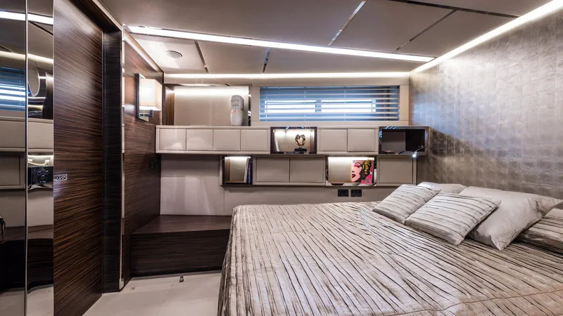  Yacht Photos Pics Luxurious bedroom interior on 2014 Admiral Silent 76 yacht, featuring modern design and elegant decor.