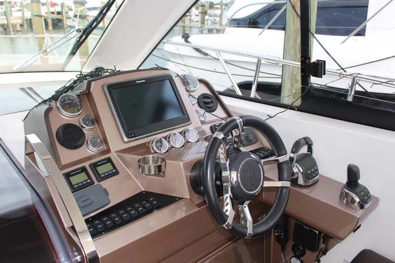  Yacht Photos Pics 2017 Galeon 385 HTS helm with modern controls and navigation display.