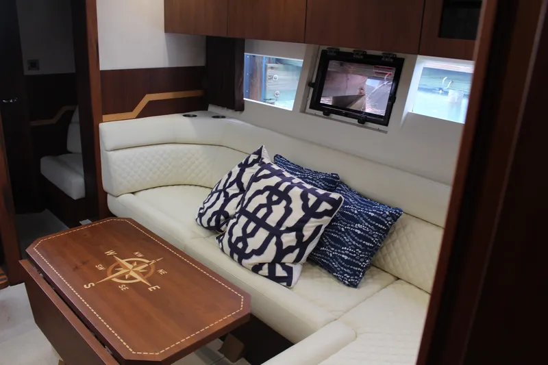  Yacht Photos Pics Luxurious interior of 2017 Galeon 385 HTS yacht with plush seating and nautical decor.