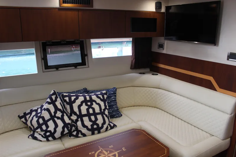  Yacht Photos Pics Luxurious interior of 2017 Galeon 385 HTS yacht with plush seating and nautical decor.
