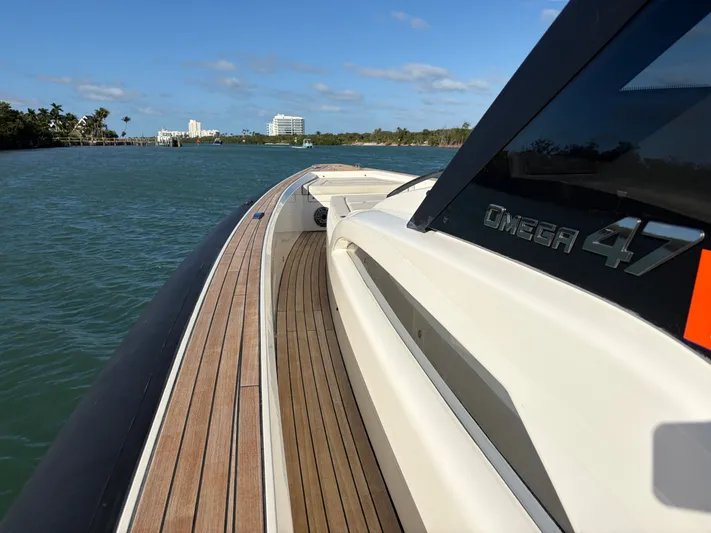  Yacht Photos Pics Technohull 47 Omega 2023 on water, side view.