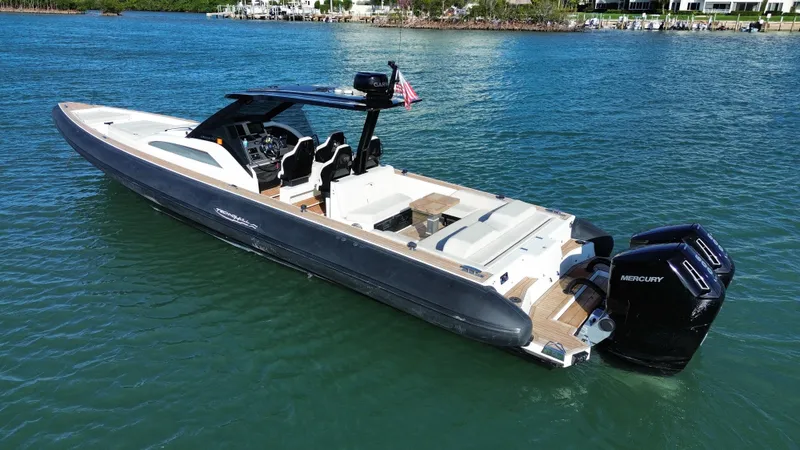  Yacht Photos Pics Technohull 47 Omega 2023 on calm water with Mercury engines.