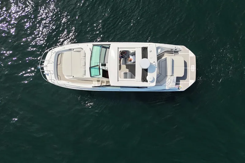  Yacht Photos Pics Aerial view of 2025 Sea Ray Sundancer 320 yacht on open water.