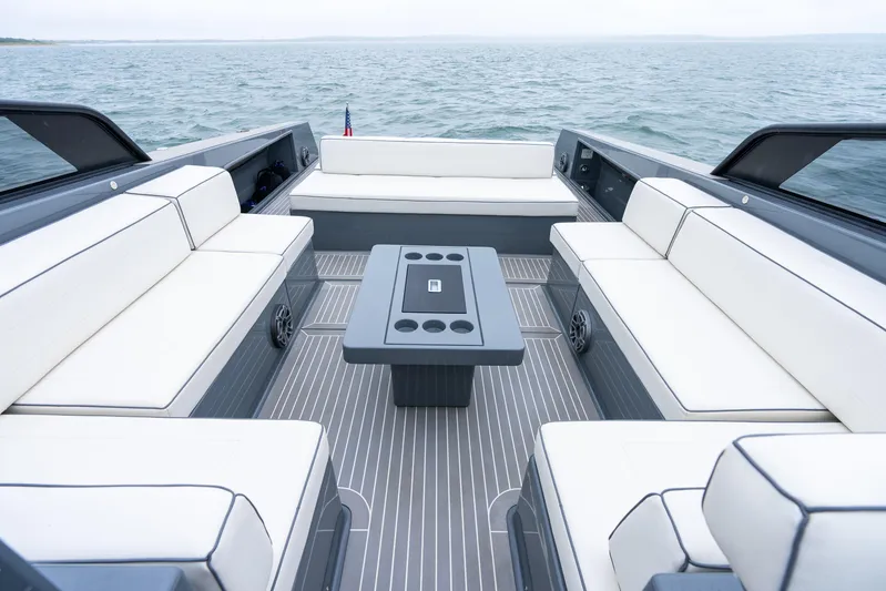 Brix Yacht Photos Pics Luxurious 2023 VanDutch 48 yacht interior with sleek seating and modern design on open water.