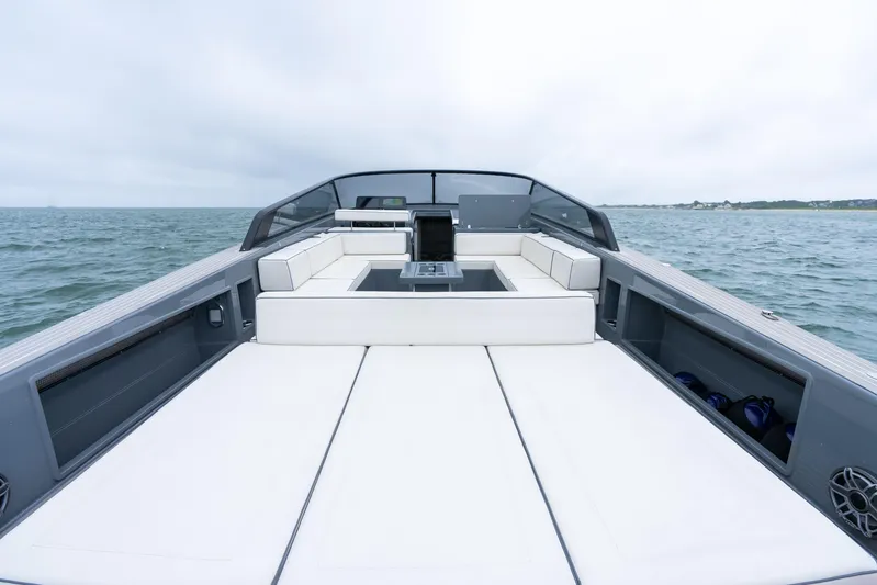 Brix Yacht Photos Pics 2023 VanDutch 48 yacht with sleek design and spacious deck on open water.