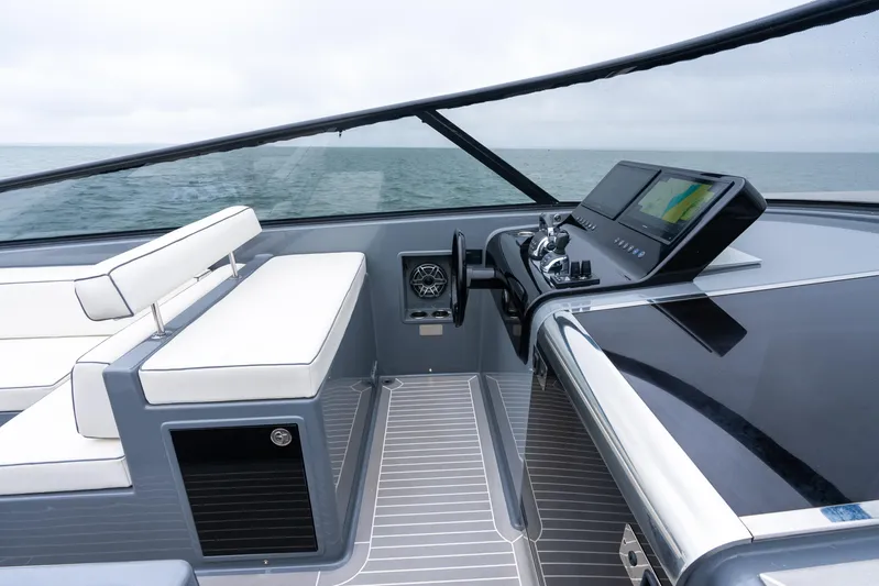 Brix Yacht Photos Pics 2023 VanDutch 48 yacht cockpit with sleek design and modern navigation system.