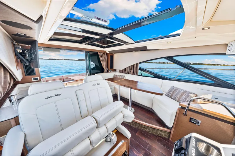  Yacht Photos Pics Luxurious interior of 2016 Sea Ray 510 Sundancer yacht with panoramic water views.
