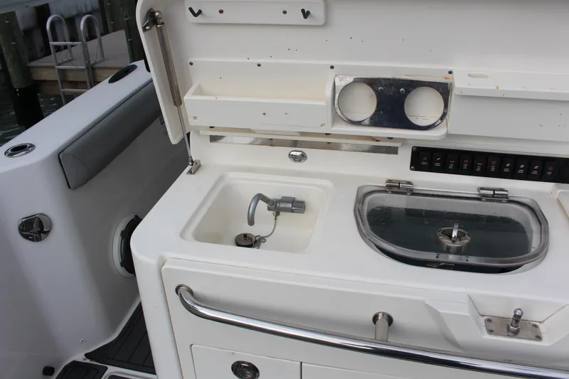 Yacht Photos Pics 2020 Boston Whaler 350 Outrage boat sink and storage area.