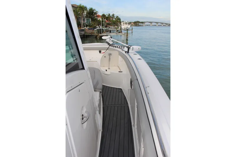  Yacht Photos Pics 2020 Boston Whaler 350 Outrage boat deck with scenic waterfront view.