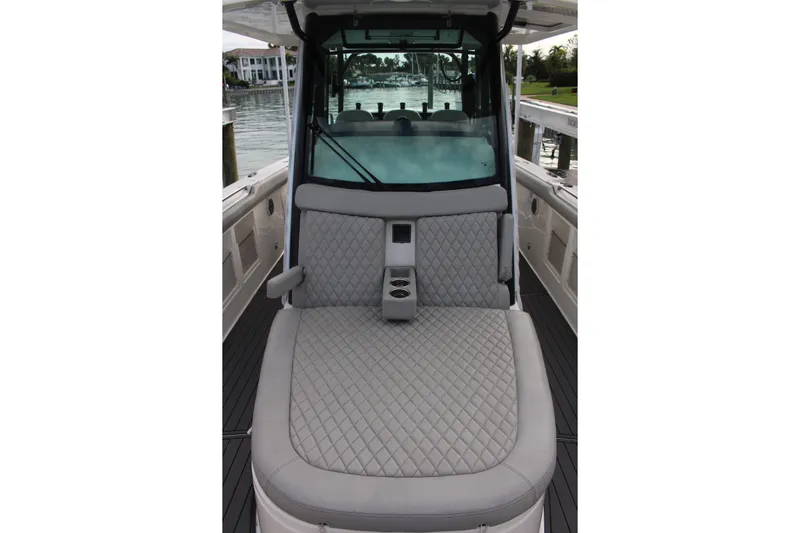  Yacht Photos Pics 2020 Boston Whaler 350 Outrage boat interior with quilted seating and cup holders.