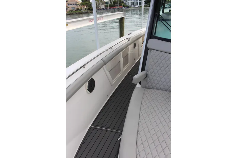  Yacht Photos Pics 2020 Boston Whaler 350 Outrage interior with quilted seating and sleek deck design.