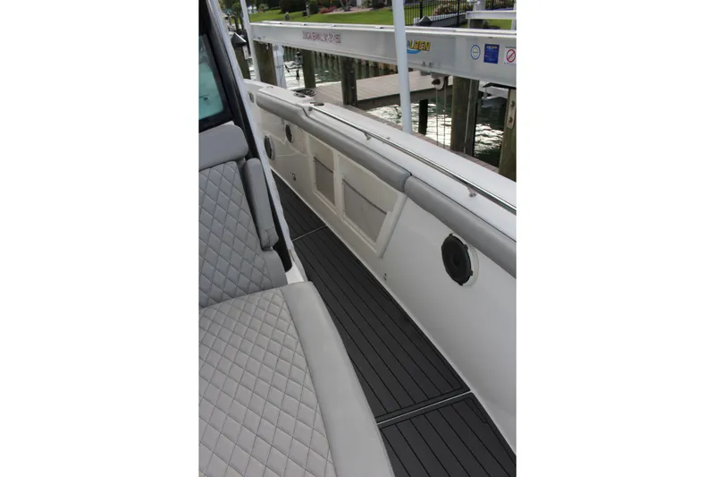  Yacht Photos Pics 2020 Boston Whaler 350 Outrage interior with quilted seating and sleek deck design.