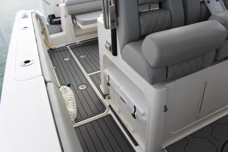  Yacht Photos Pics 2020 Boston Whaler 350 Outrage interior with gray seating and deck details.