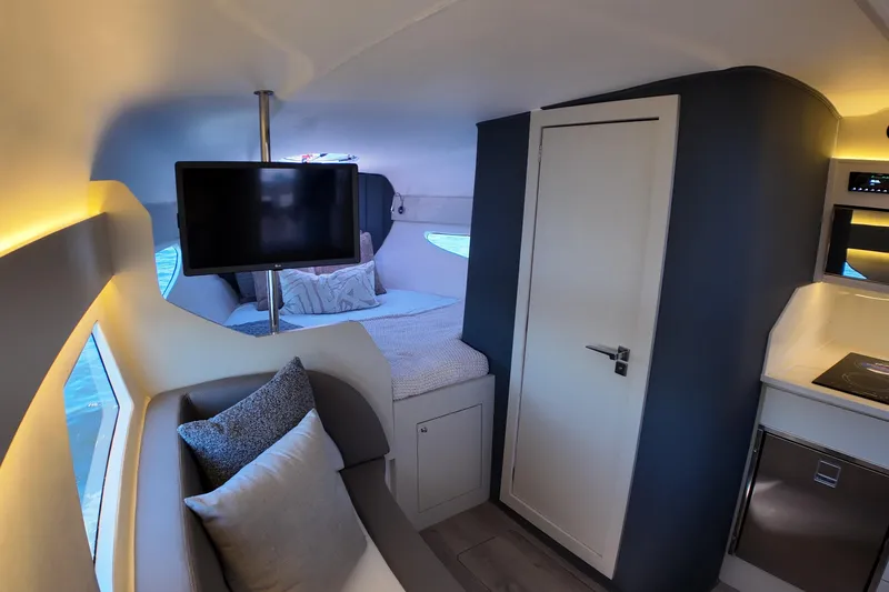  Yacht Photos Pics Luxurious interior of 2025 Valiatt 350GT yacht with modern amenities and cozy seating.