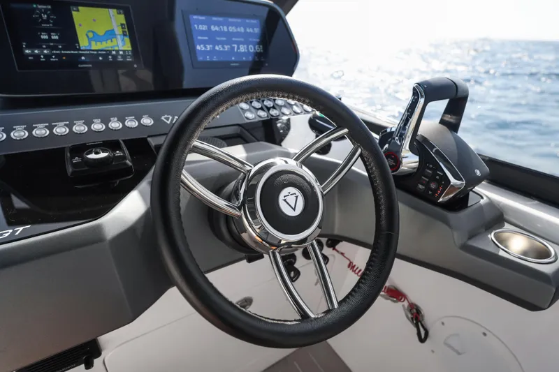  Yacht Photos Pics Steering wheel and controls of 2025 Valiatt 350GT boat, with ocean view.