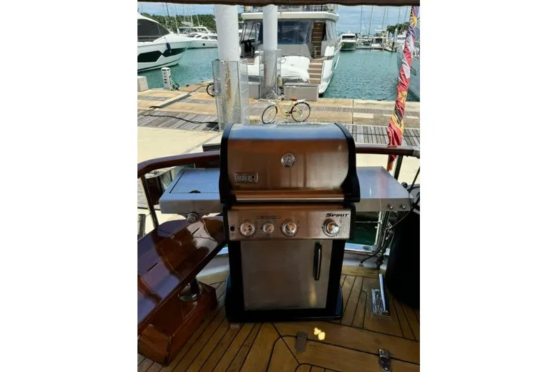 Yacht Photos Pics Outdoor grill on a Don Brooke 77 yacht, docked at a marina, 1987 model.