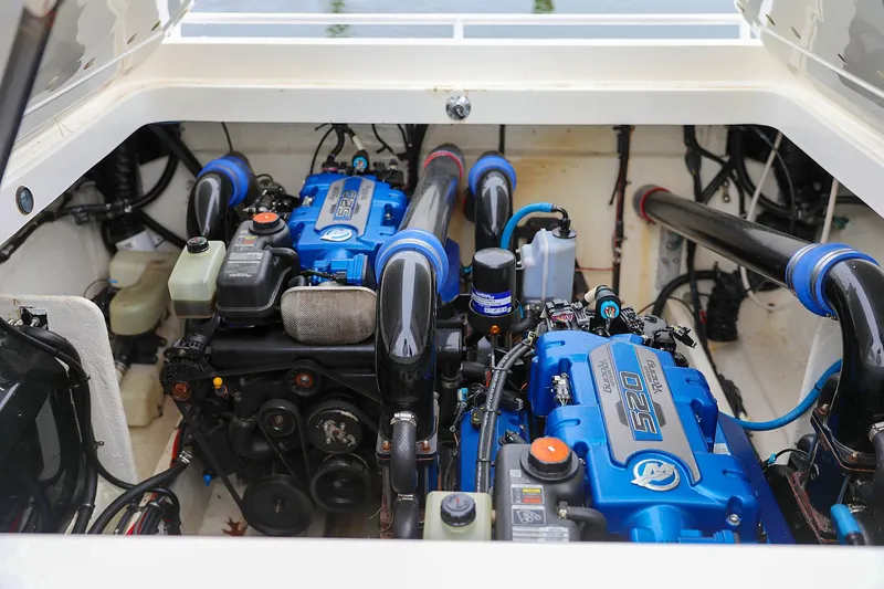  Yacht Photos Pics Twin engines in a 2001 Fountain Lightning 42 boat, showcasing powerful performance.