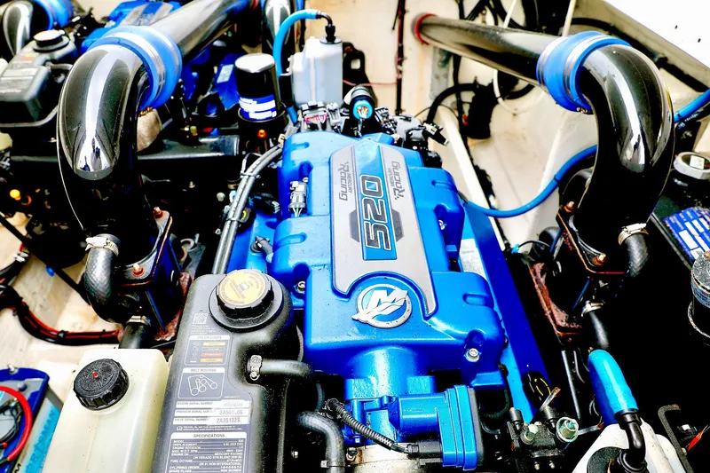  Yacht Photos Pics Close-up of a 2001 Fountain Lightning 42 engine, showcasing its intricate components.