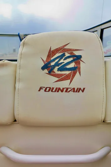  Yacht Photos Pics 2001 Fountain Lightning 42 boat seat with embroidered logo.