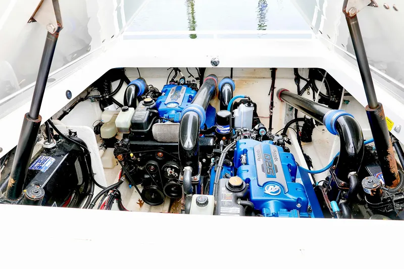  Yacht Photos Pics Engine compartment of 2001 Fountain Lightning 42 boat with dual blue engines.