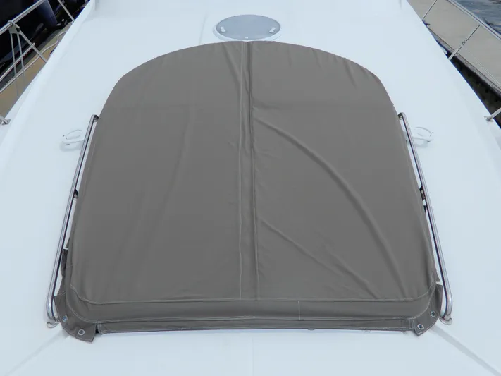  Yacht Photos Pics 2008 Cruisers Yachts 460 Express with covered deck area, featuring sleek design and durable materials.