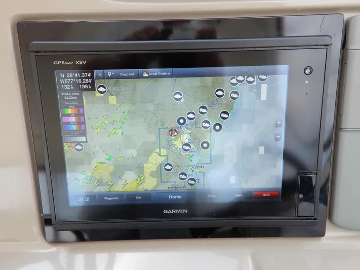  Yacht Photos Pics Garmin GPS display on 2008 Cruisers Yachts 460 Express showing weather map and navigation data.