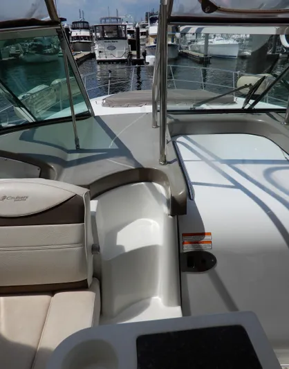  Yacht Photos Pics 2008 Cruisers Yachts 460 Express interior with marina view in background.