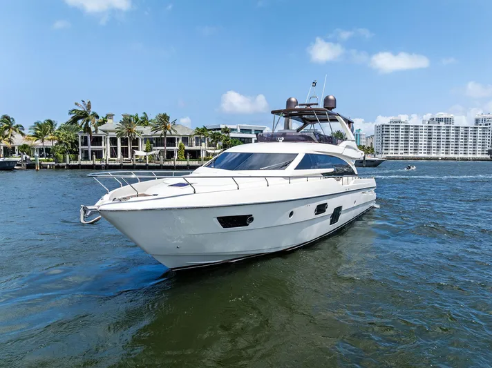 Blue Abalone Yacht Photos Pics 2015 Ferretti Yachts 690 cruising on a sunny day near waterfront properties.